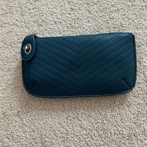 Fossil clutch and cross body